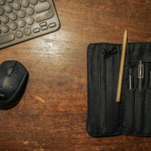 black computer keyboard beside black computer mouse