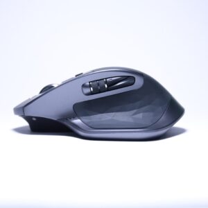 black cordless computer mouse on white surface