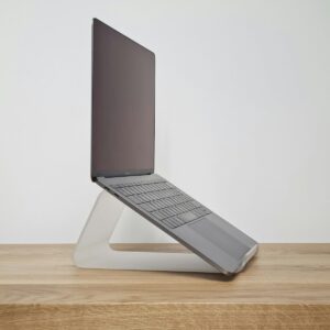 black and silver laptop computer on brown wooden table