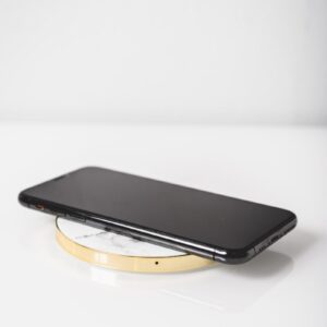 black android smartphone on white surface