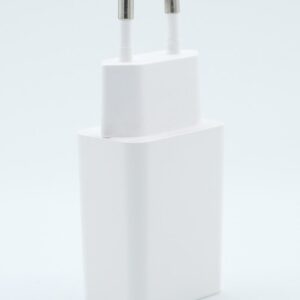 a close up of an apple charger with two plugs