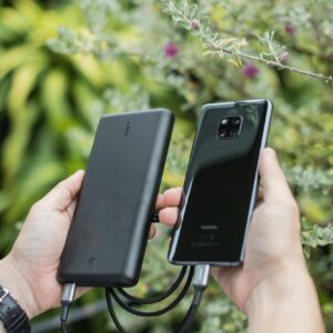 black smartphone connect to power bank