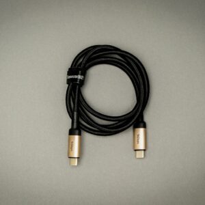 black usb cable on white table
